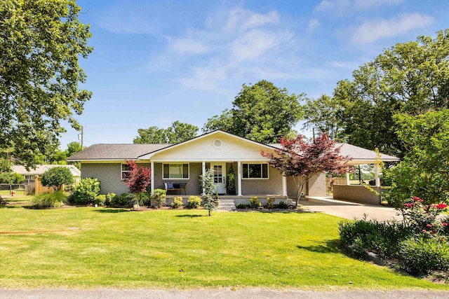 520 E 8th St, Lonoke, AR 72086 - view of front of home featuring covered porch, driveway, a carport, and brick siding