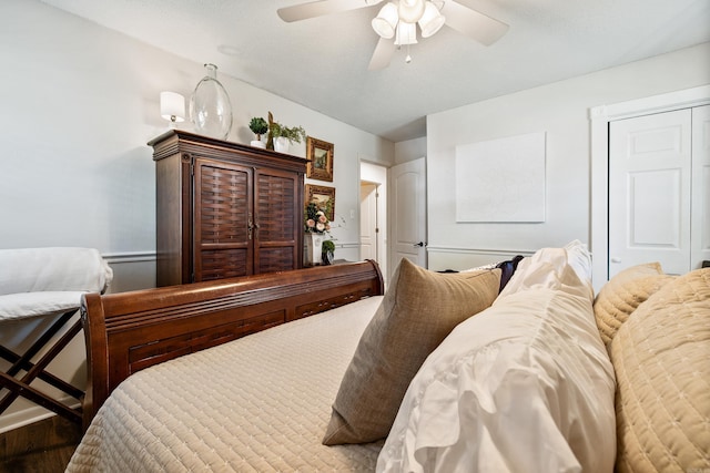 520 E 8th St, Lonoke, AR 72086 - bedroom with ceiling fan, a closet, and wood finished floors