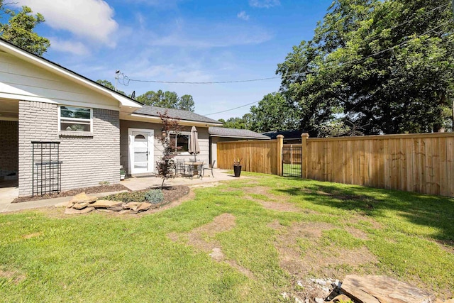 520 E 8th St, Lonoke, AR 72086 - view of yard featuring a patio area