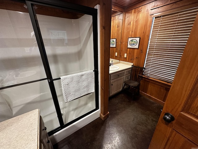 410 S Riverview Ln, Mountain View, AR 72560 - bathroom featuring wood walls, a shower stall, concrete flooring, and vanity