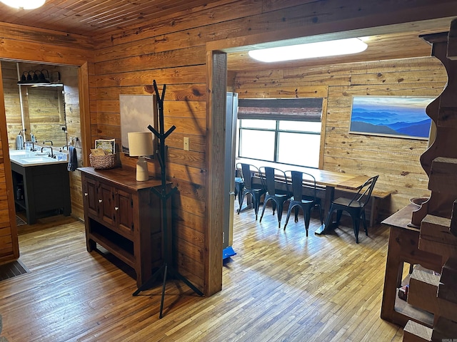 410 S Riverview Ln, Mountain View, AR 72560 - dining space featuring wood walls, hardwood / wood-style floors, and wood ceiling