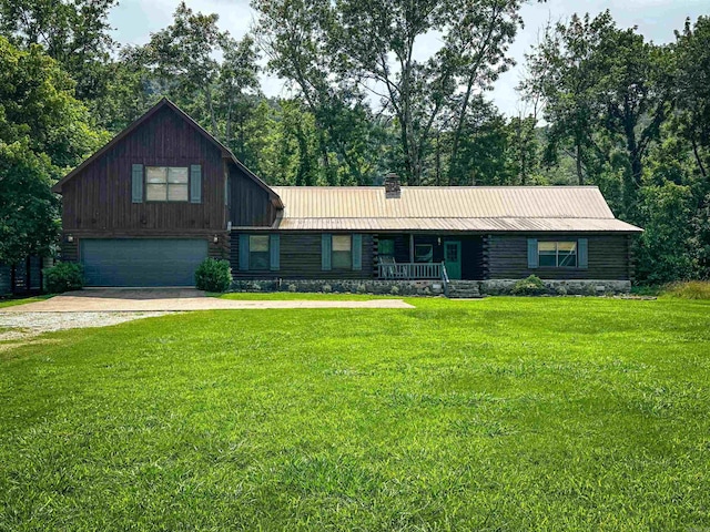 410 S Riverview Ln, Mountain View, AR 72560 - cabin featuring driveway, a garage, a front lawn, a porch, and a chimney