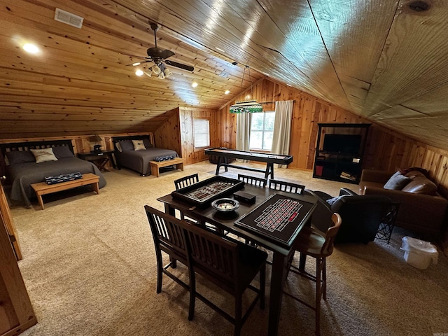 410 S Riverview Ln, Mountain View, AR 72560 - dining space featuring vaulted ceiling, carpet, wooden walls, ceiling fan, and wood ceiling