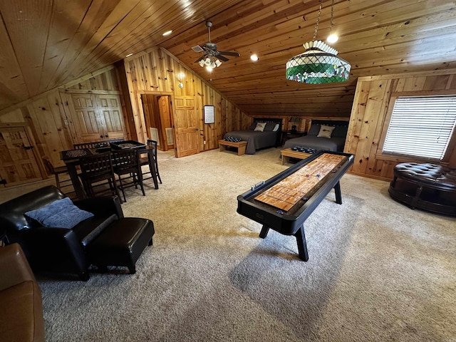 410 S Riverview Ln, Mountain View, AR 72560 - carpeted living room featuring lofted ceiling, wood walls, wood ceiling, and a ceiling fan