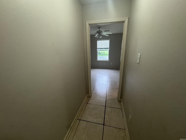 1010 Tori Ln, Beebe, AR 72012 - corridor with light tile patterned floors and baseboards
