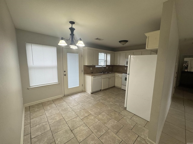1010 Tori Ln, Beebe, AR 72012 - kitchen featuring white appliances, a chandelier, white cabinetry, and decorative light fixtures