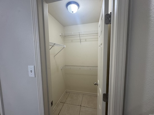 1010 Tori Ln, Beebe, AR 72012 - spacious closet featuring tile patterned floors