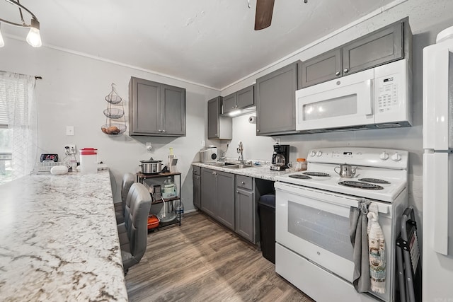 172 Susie Ln, Mena, AR 71953 - kitchen featuring white appliances, dark wood-style flooring, gray cabinetry, light stone countertops, and ceiling fan