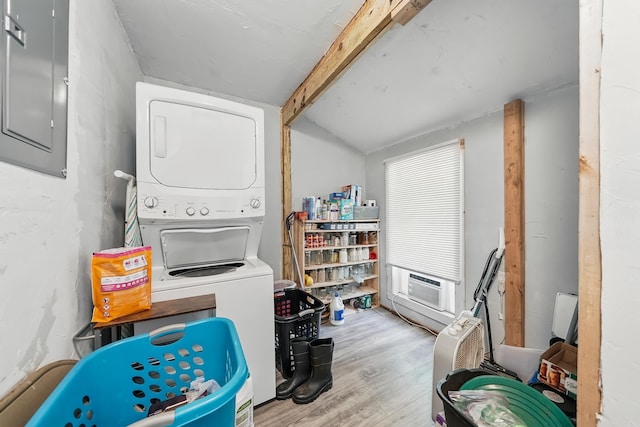172 Susie Ln, Mena, AR 71953 - washroom with stacked washer / drying machine, electric panel, cooling unit, and wood finished floors