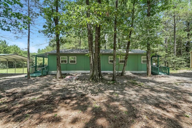 172 Susie Ln, Mena, AR 71953 - view of side of property featuring a carport