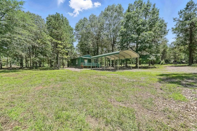 172 Susie Ln, Mena, AR 71953 - view of grassy yard featuring a detached carport