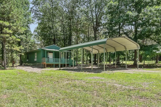 172 Susie Ln, Mena, AR 71953 - view of community with a carport and a lawn