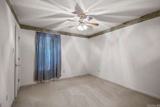 3905 Deer Dr, Benton, AR 72019 - unfurnished room with carpet flooring, a textured ceiling, and a ceiling fan