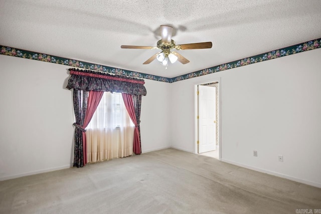 3905 Deer Dr, Benton, AR 72019 - carpeted empty room featuring a ceiling fan and a textured ceiling