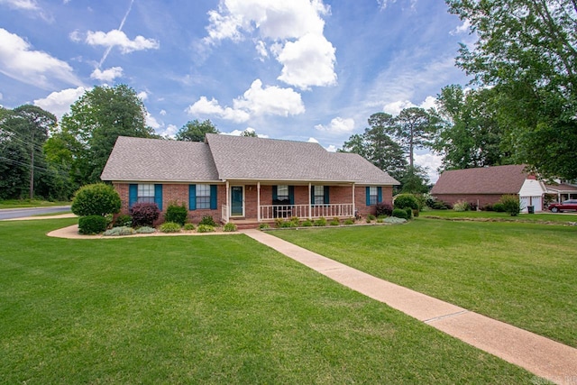 3905 Deer Dr, Benton, AR 72019 - ranch-style home with covered porch, brick siding, a front lawn, and a shingled roof