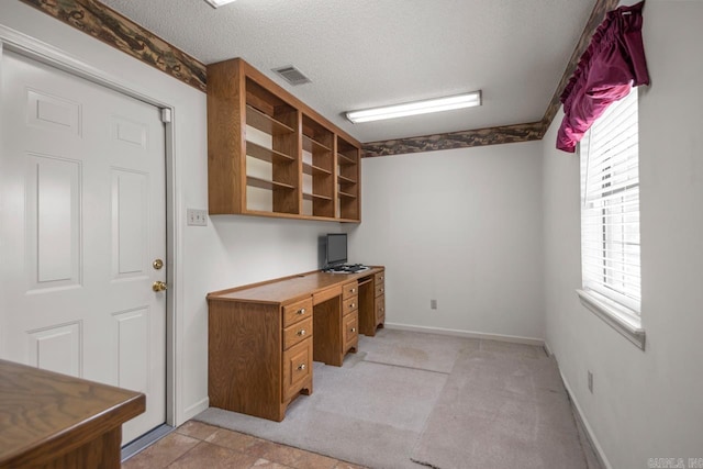 3905 Deer Dr, Benton, AR 72019 - unfurnished office featuring built in study area and a textured ceiling