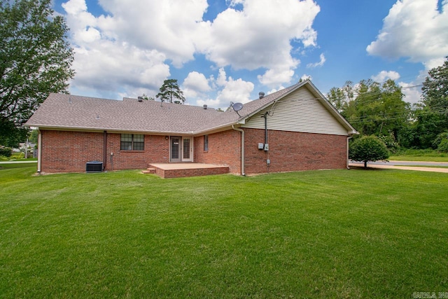 3905 Deer Dr, Benton, AR 72019 - rear view of house with brick siding and a lawn