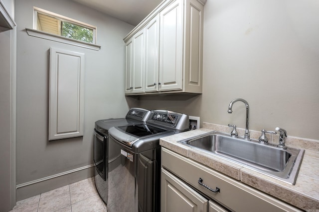 12 Cobblestone Way, Little Rock, AR 72223 - washroom featuring washer and dryer, cabinet space, and light tile patterned floors