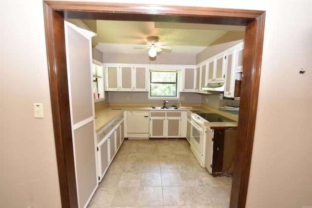 230 Spring St, Fairfield Bay, AR 72088 - kitchen with white appliances, under cabinet range hood, ceiling fan, light tile patterned flooring, and white cabinetry