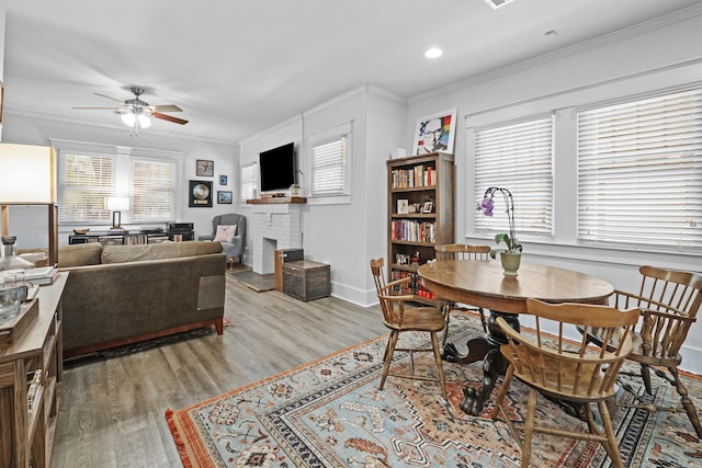 100 Melrose Dv, North Little Rock, AR 72114 - living area with ceiling fan, ornamental molding, light wood-style flooring, a fireplace, and recessed lighting