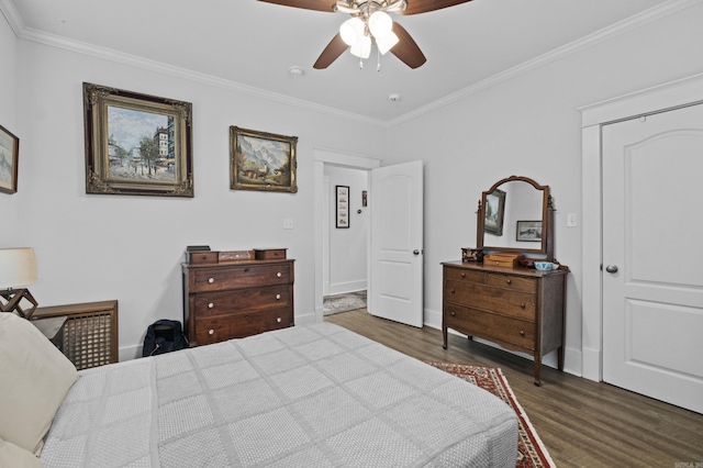 100 Melrose Dv, North Little Rock, AR 72114 - bedroom with wood finished floors, crown molding, and a ceiling fan