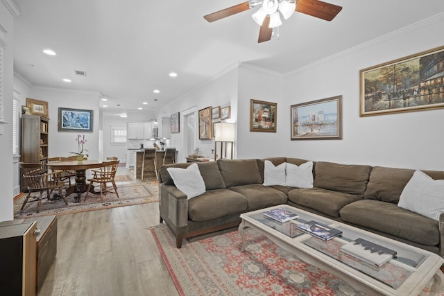 100 Melrose Dv, North Little Rock, AR 72114 - living room featuring light wood-style flooring, recessed lighting, ceiling fan, and crown molding