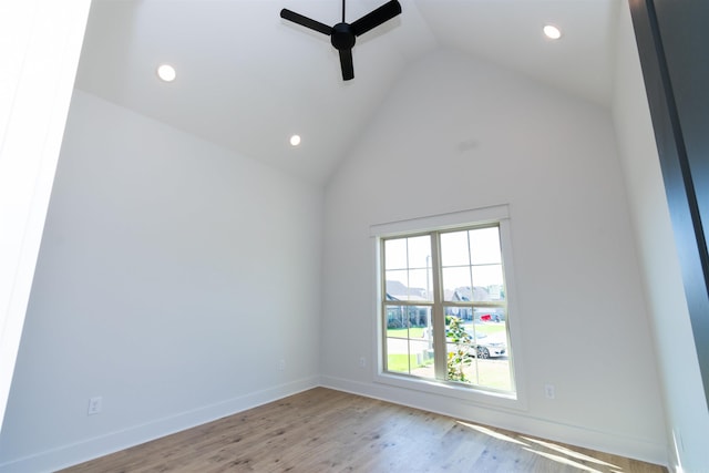 2284 Sistine Chapel Cir, Jonesboro, AR 72404 - empty room featuring ceiling fan, recessed lighting, wood finished floors, and high vaulted ceiling