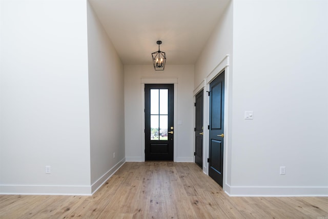 2284 Sistine Chapel Cir, Jonesboro, AR 72404 - foyer featuring a chandelier and light wood-style floors