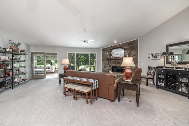 96 San Sebastian Way, Hot Springs Village, AR 71909 - carpeted living room featuring a ceiling fan, lofted ceiling, and a stone fireplace