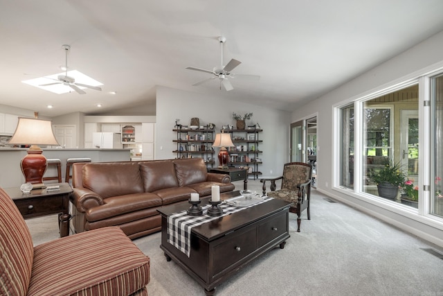 96 San Sebastian Way, Hot Springs Village, AR 71909 - living room with a ceiling fan, lofted ceiling, and light colored carpet