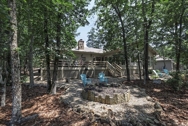 96 San Sebastian Way, Hot Springs Village, AR 71909 - rear view of property featuring a wooden deck, a chimney, and stairway