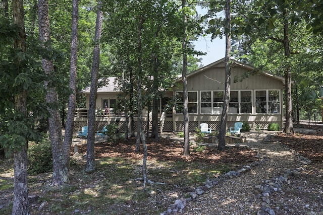 96 San Sebastian Way, Hot Springs Village, AR 71909 - rear view of property featuring a sunroom
