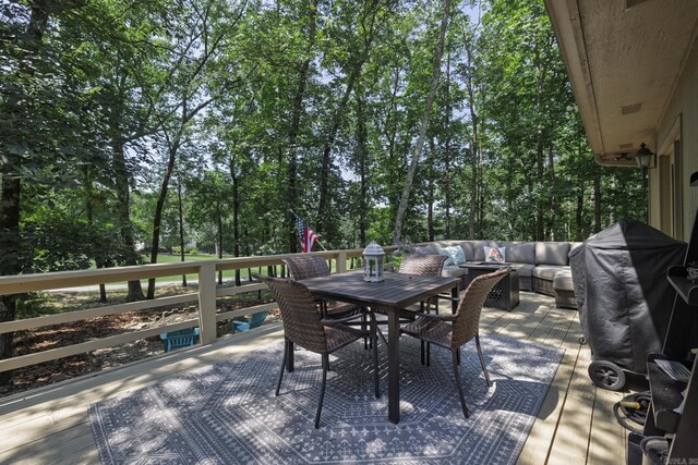 96 San Sebastian Way, Hot Springs Village, AR 71909 - wooden deck featuring an outdoor hangout area, outdoor dining area, and view of wooded area