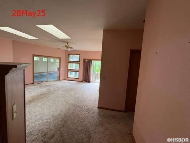 1116 Mccracken Ridge Rd, Mountain Home, AR 72653 - unfurnished living room featuring a skylight and carpet
