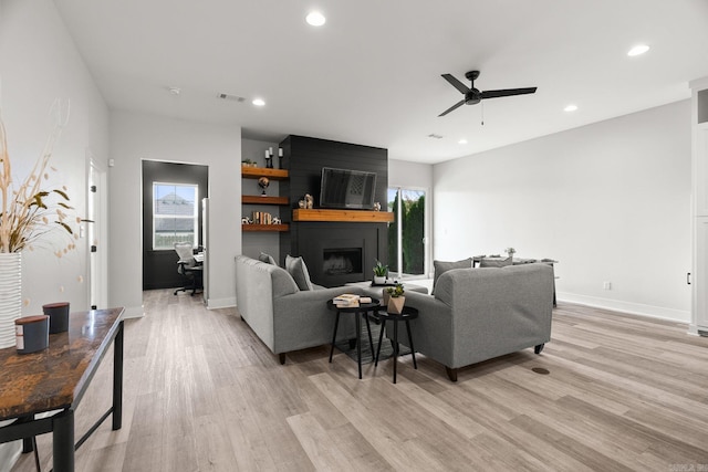127 Copper Cir, Little Rock, AR 72223 - living area with plenty of natural light, a ceiling fan, light wood-style flooring, a large fireplace, and recessed lighting