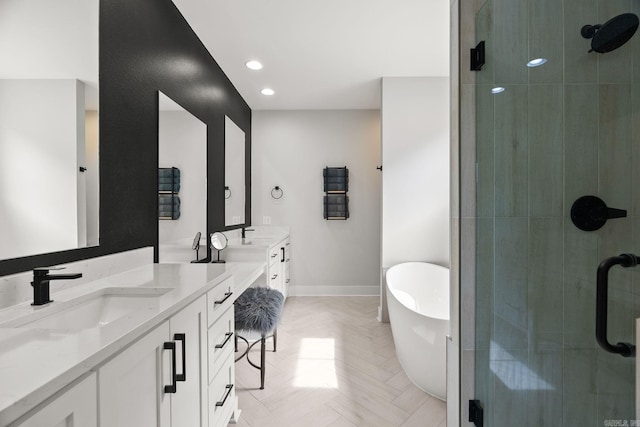 127 Copper Cir, Little Rock, AR 72223 - bathroom featuring double vanity, a stall shower, a soaking tub, and recessed lighting