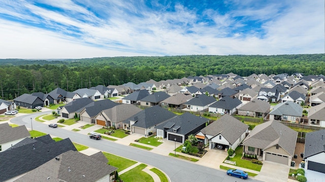 127 Copper Cir, Little Rock, AR 72223 - aerial perspective of suburban area featuring a heavily wooded area