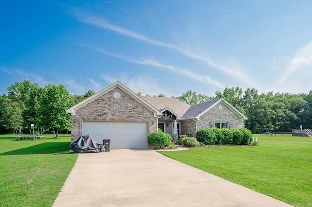 241 Sandy Creek Dr, Ward, AR 72176 - view of front of property with a front lawn, concrete driveway, a garage, and brick siding