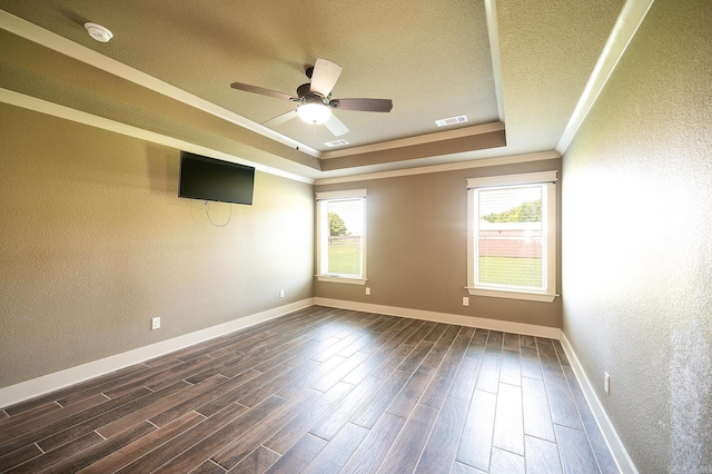 241 Sandy Creek Dr, Ward, AR 72176 - empty room featuring a tray ceiling, a smoke detector, a textured wall, ceiling fan, and dark wood-style flooring