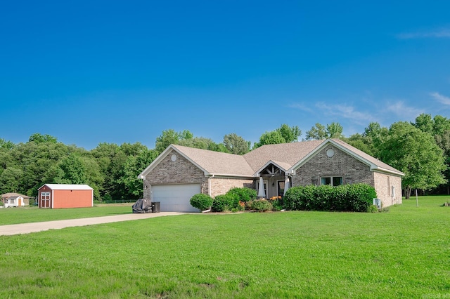 241 Sandy Creek Dr, Ward, AR 72176 - single story home featuring driveway, a front lawn, brick siding, and an attached garage