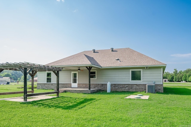 241 Sandy Creek Dr, Ward, AR 72176 - back of property with a pergola, a ceiling fan, a yard, brick siding, and a patio