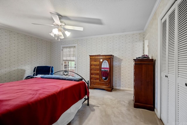 11414 E Stoney Point Ct, Little Rock, AR 72211 - bedroom featuring ornamental molding, carpet, a closet, a ceiling fan, and a textured ceiling