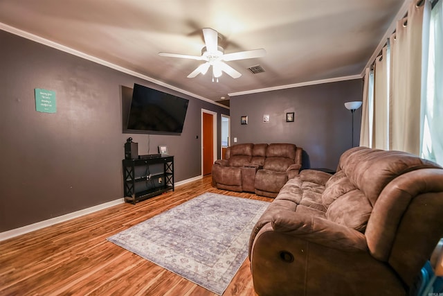 3215 Edgewood Rd, El Dorado, AR 71730 - living area with ceiling fan, wood finished floors, and ornamental molding