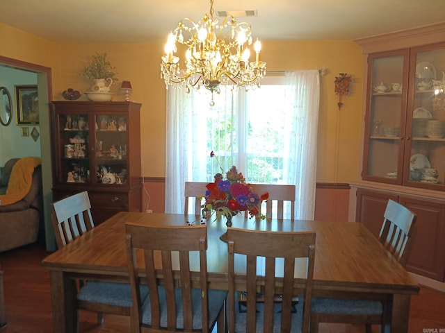 1402 Holmes Rd, Searcy, AR 72143 - dining room with a chandelier and wood finished floors