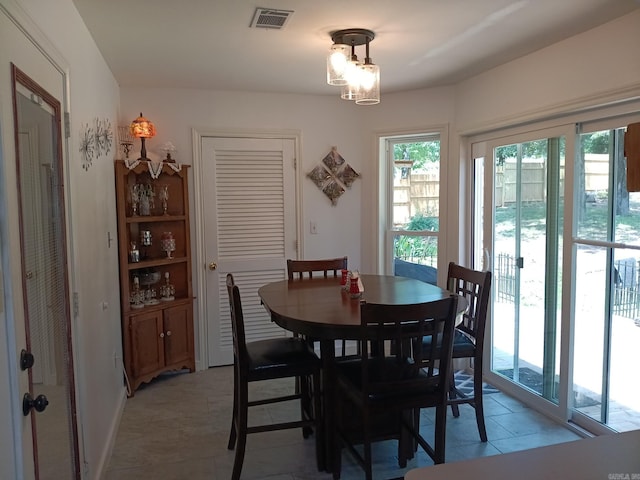 1402 Holmes Rd, Searcy, AR 72143 - dining space with light tile patterned floors