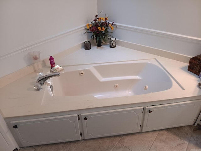 1402 Holmes Rd, Searcy, AR 72143 - bathroom with tile patterned floors and a whirlpool tub
