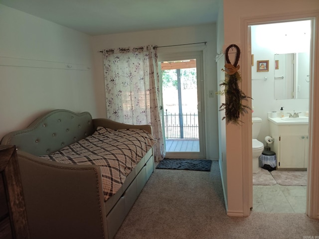 1402 Holmes Rd, Searcy, AR 72143 - bedroom with access to outside, carpet floors, and connected bathroom