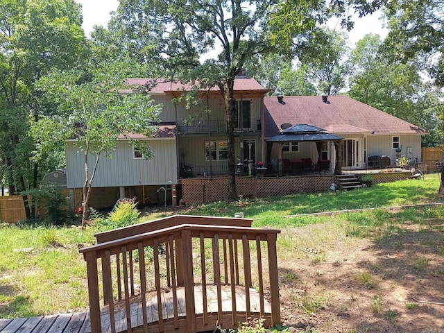 1402 Holmes Rd, Searcy, AR 72143 - rear view of property with a wooden deck