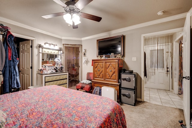 344 Austin Creek Dr, Austin, AR 72007 - tiled bedroom featuring carpet floors, ornamental molding, a ceiling fan, and ensuite bathroom