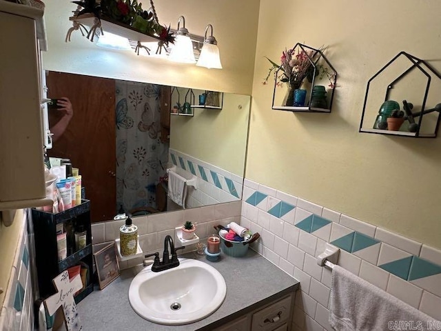 123 Quilters Ln, Hot Springs, AR 71909 - full bathroom featuring vanity, a wainscoted wall, tile walls, and curtained shower
